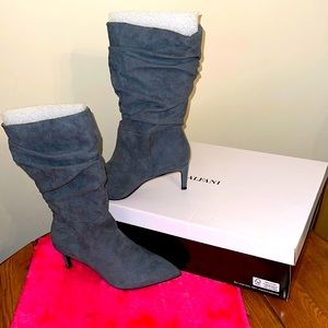Over the ankle boots, brand new. Color is Gray, size 7.5.